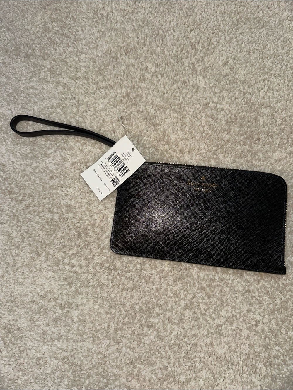 kate spade black saffiano wristlet with gold logo